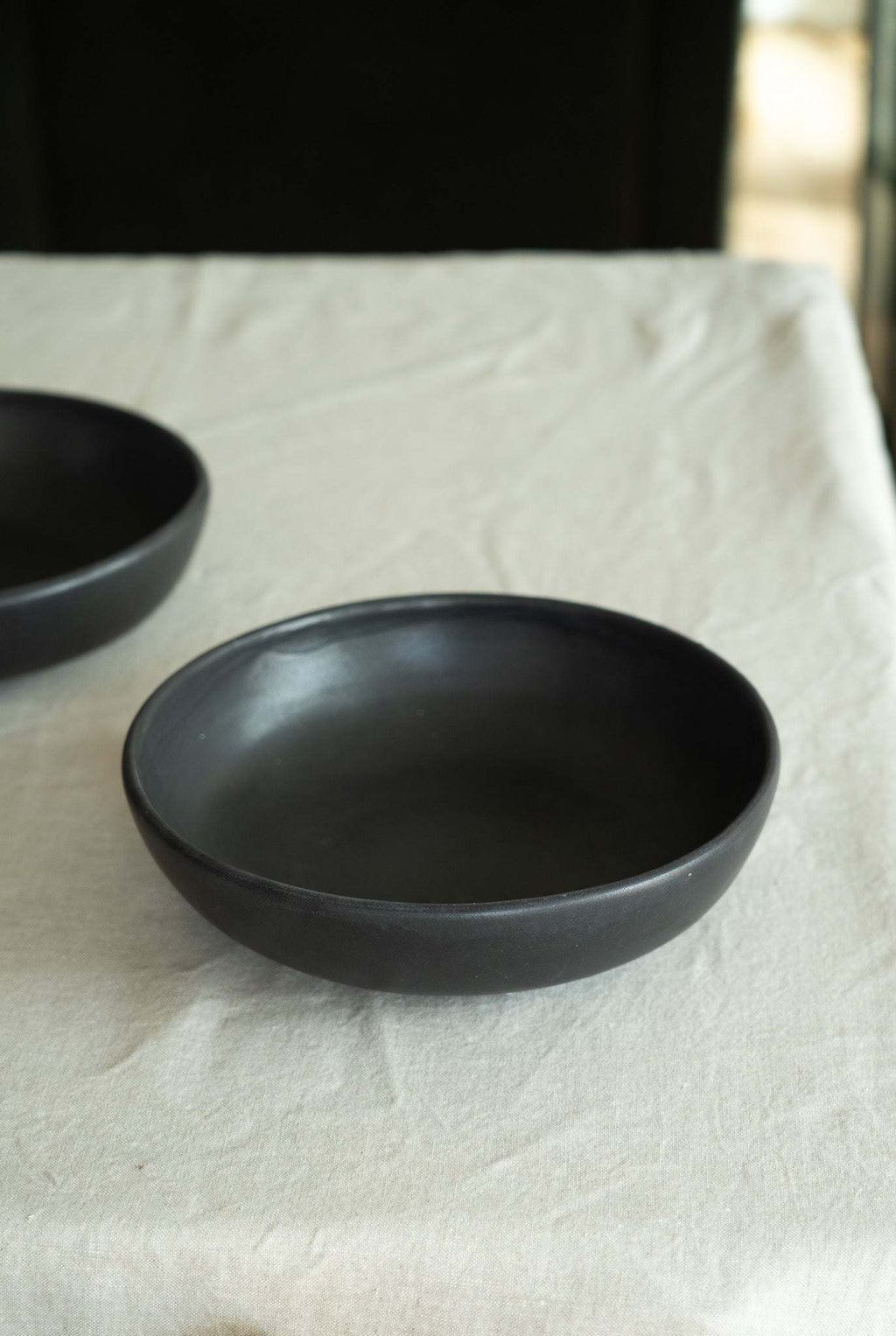 Black matte stoneware pasta bowl, empty, shown from above