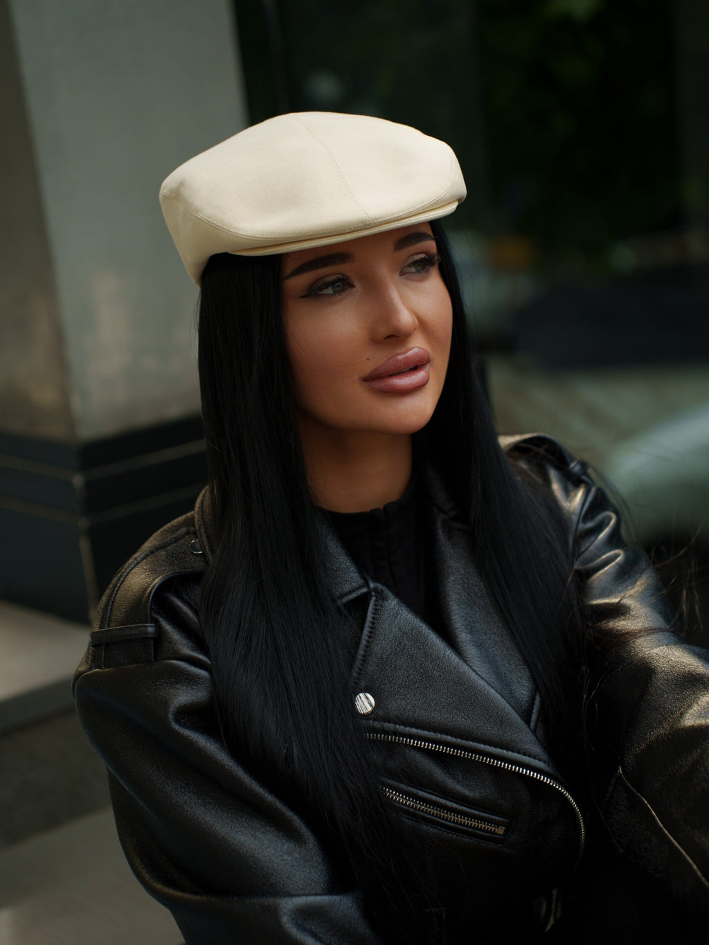 Ivory cotton ivy cap hat on model, rounded crown and stitched seams
