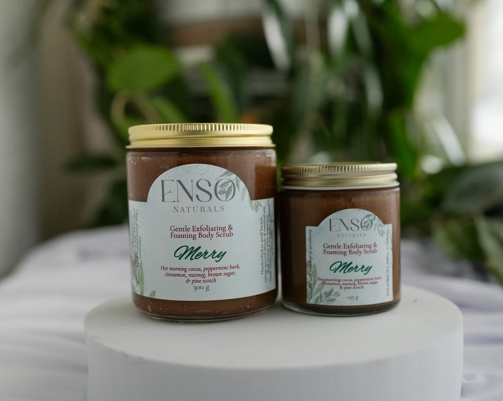 Gentle foaming sugar scrub jars with gold lids, brown and pale green tubs