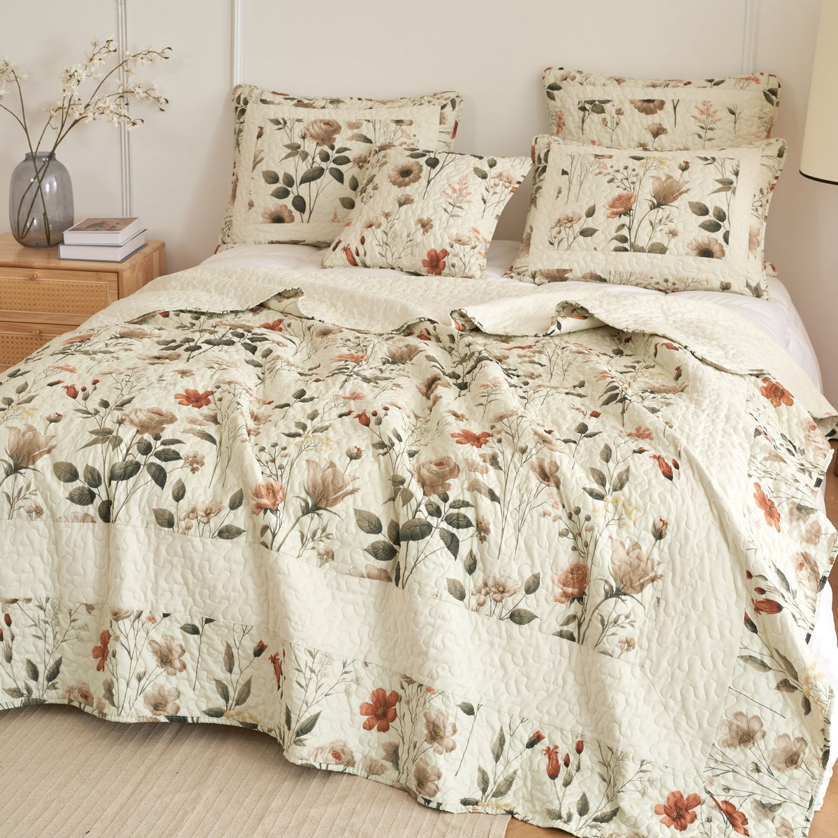 Cream floral quilt set with quilted bedspread and matching pillow shams