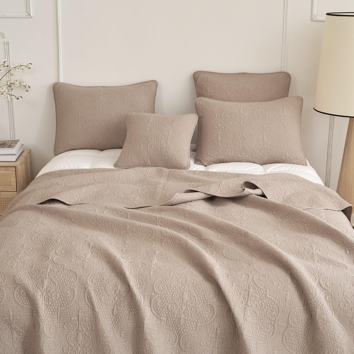 Taupe-beige quilted bedspread with three matching textured pillows