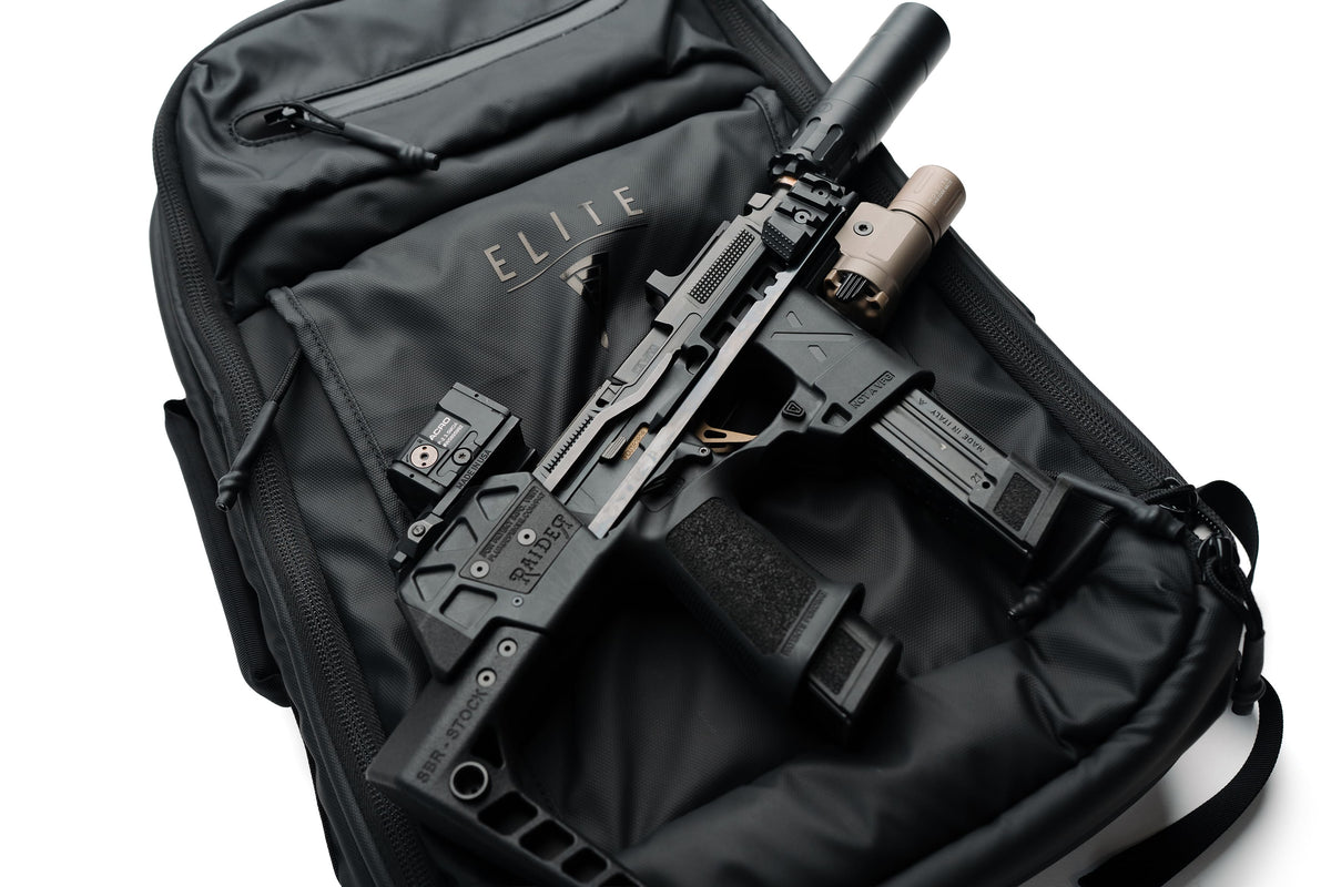 SBR backpack interior close-up with ELITE branding and secured tactical firearm components
