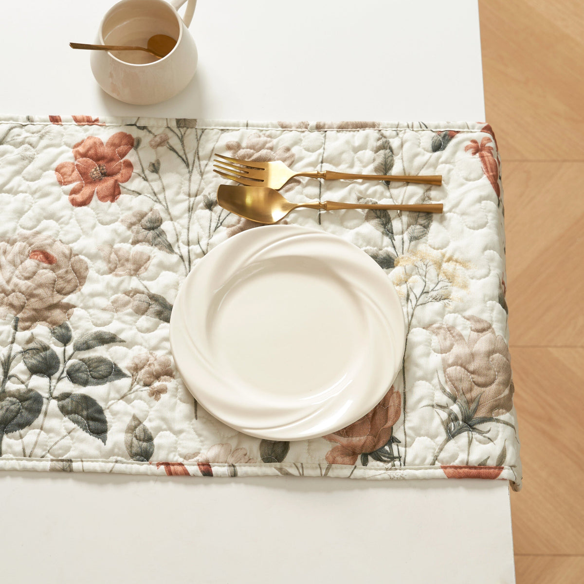 Quilted dinner table runner with floral design, beige base for plates and cutlery
