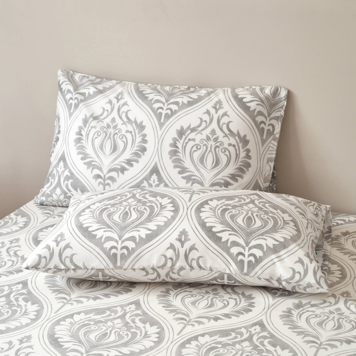 Gray and white damask ogee-pattern pillowcase set with folded hem detail