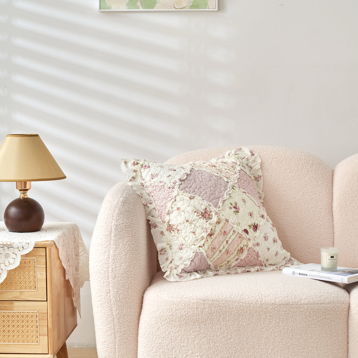 Floral patchwork pillow cover with ruffle trim and blush, cream quilted panels