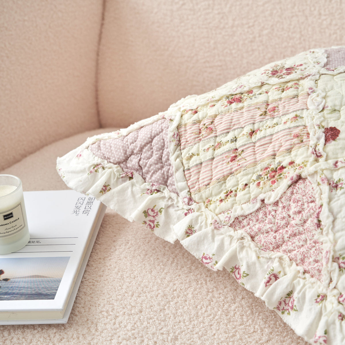 Quilted floral patchwork pillow cover with striped and blush fabric panels