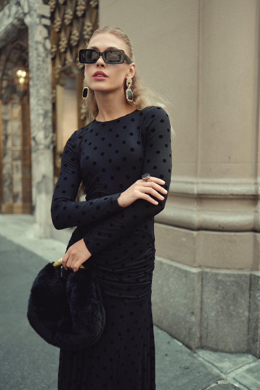 Black mesh dot maxi dress with long sleeves, ruched waist and fitted silhouette