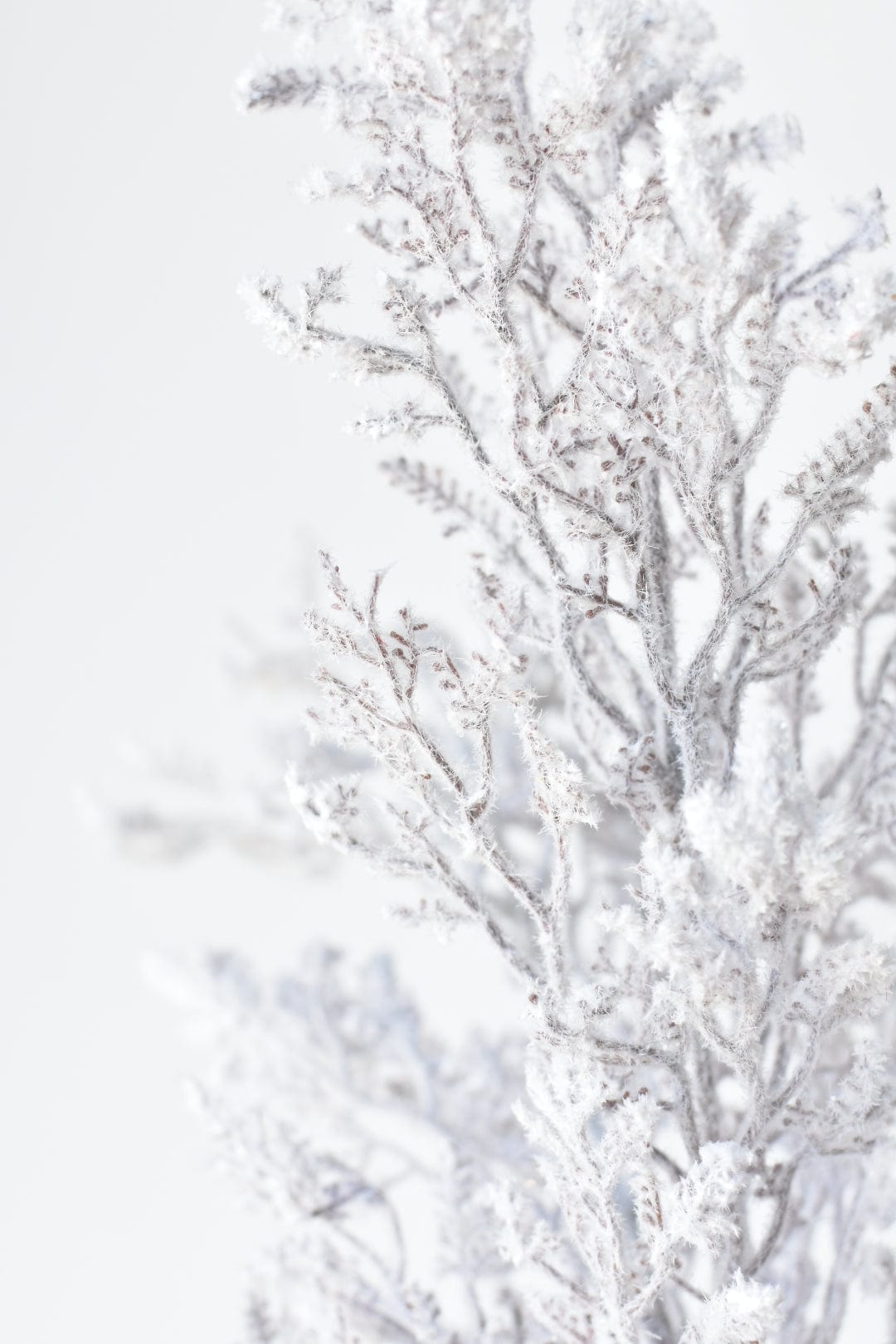Faux flocked twig bundle with white-silver frosted branches, dense textured twigs