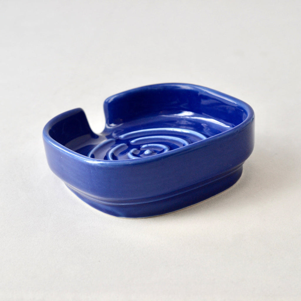 Cobalt blue porcelain soapdish with raised drain ridges and shallow basin