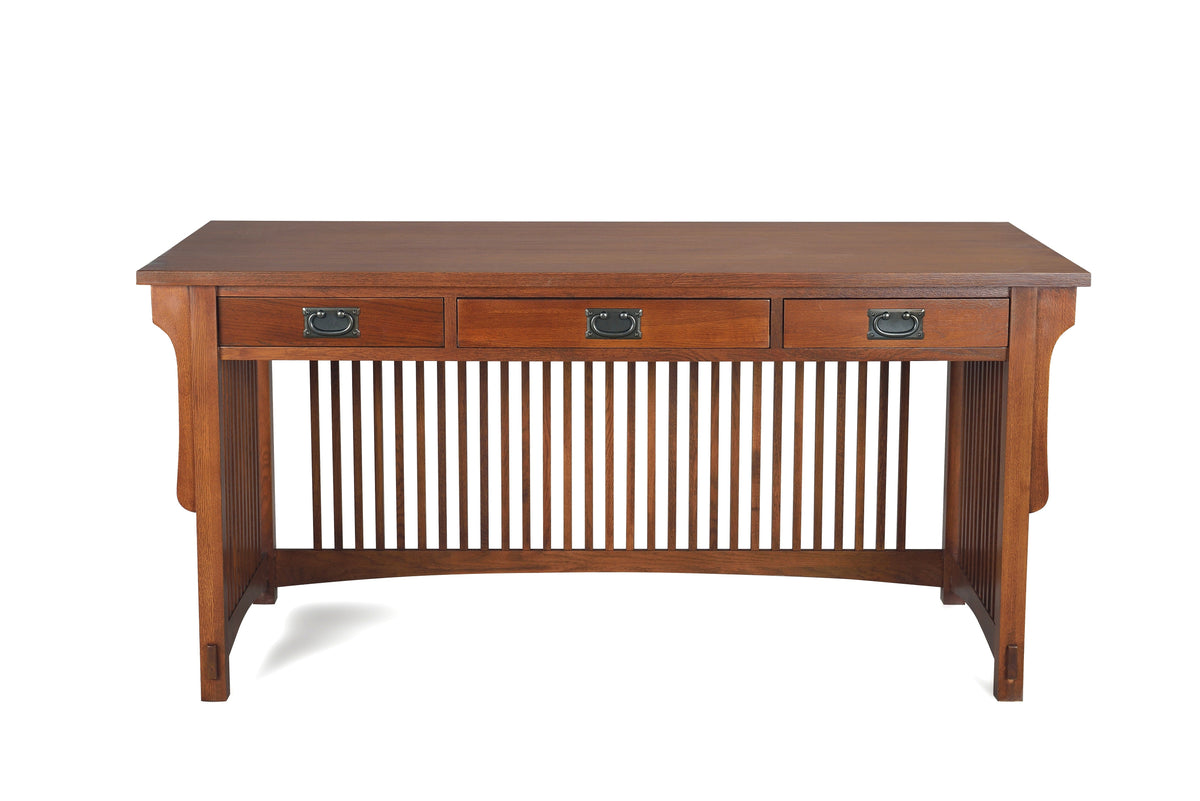 Wood library desk with three drawers and slatted center panel, warm brown finish on white.
