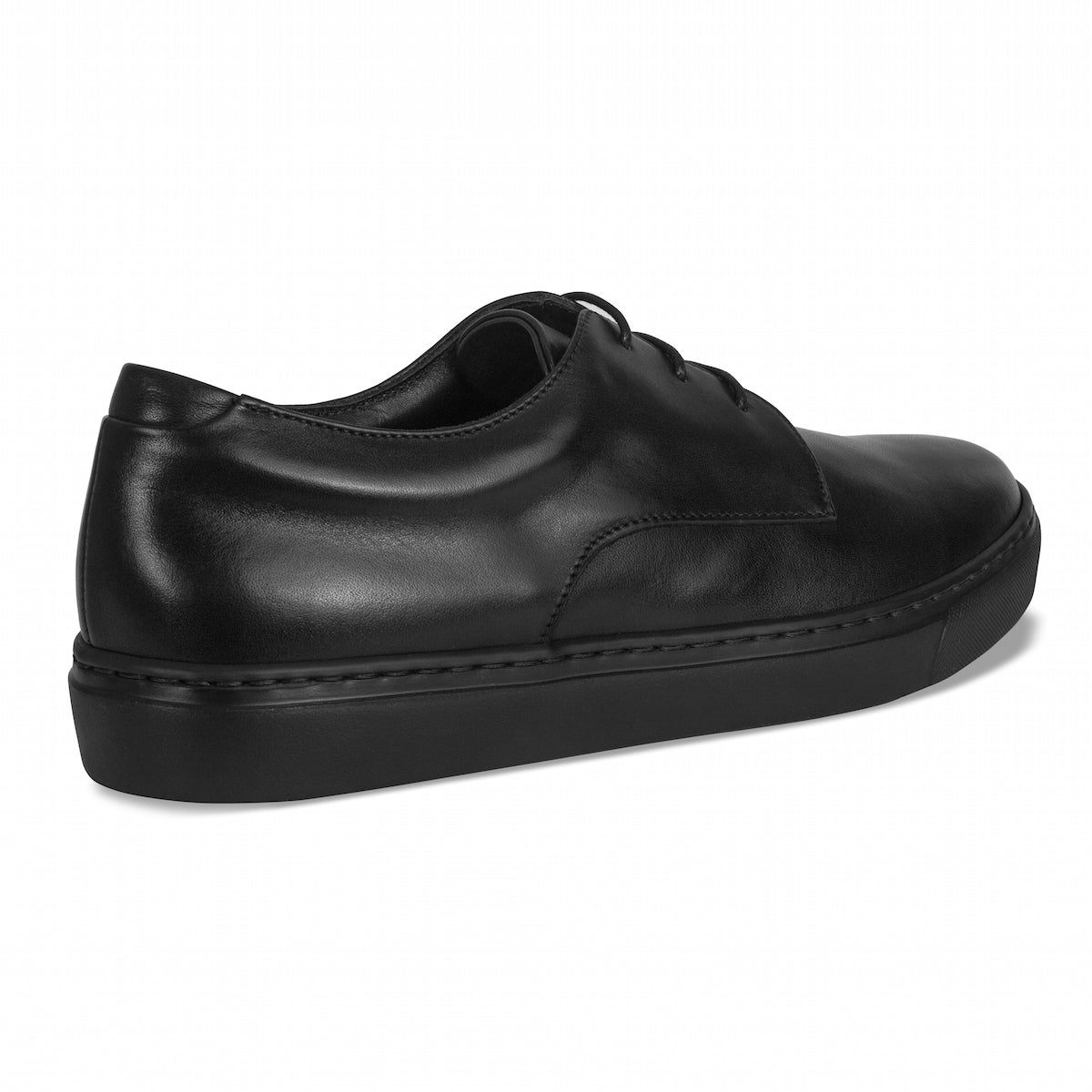 Black leather lace-up oxford shoes with rounded toe and thick rubber sole.