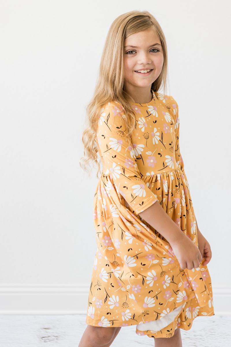 Girls orange floral 3/4 sleeve twirl dress with gathered waist and full skirt