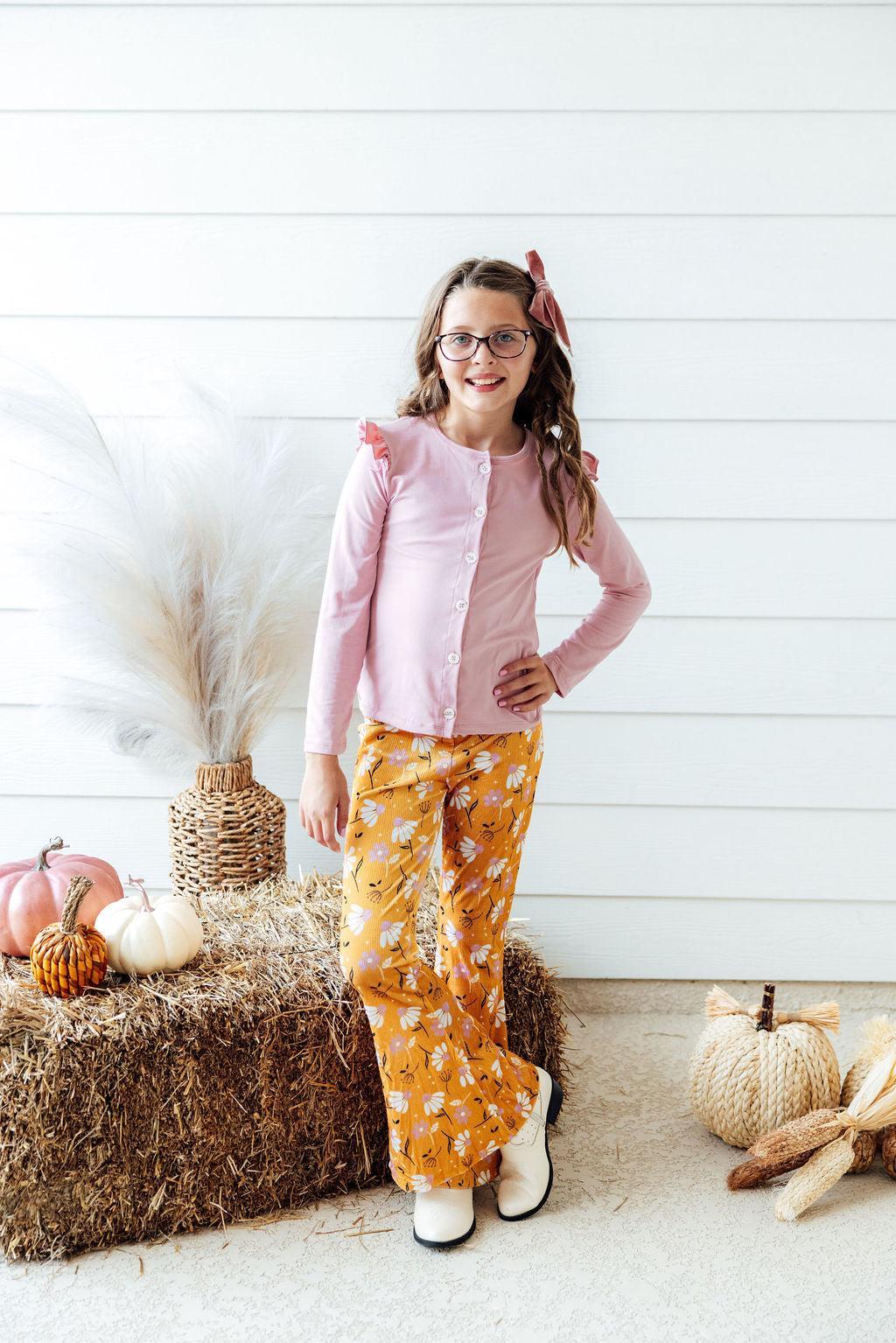Girls' ribbed velvet bell pants in mustard yellow with orange floral print