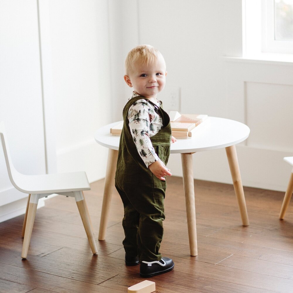 Kids' easy-on barefoot shoes, black slip-on with white trim at ankle