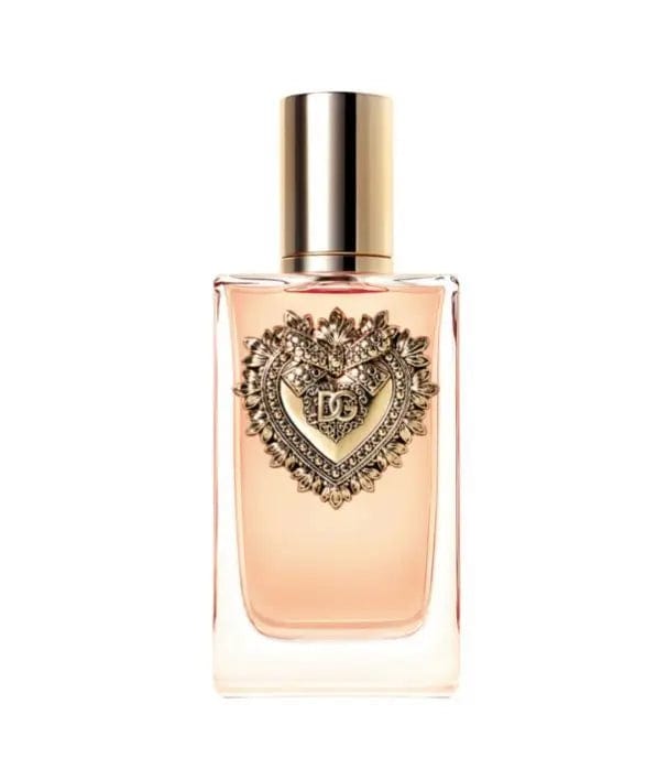 Women’s Eau de Parfum bottle with gold cap and detailed heart emblem on pink glass