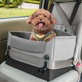 Grey dog car seat booster with padded sides, raised bolsters, and safety leash strap