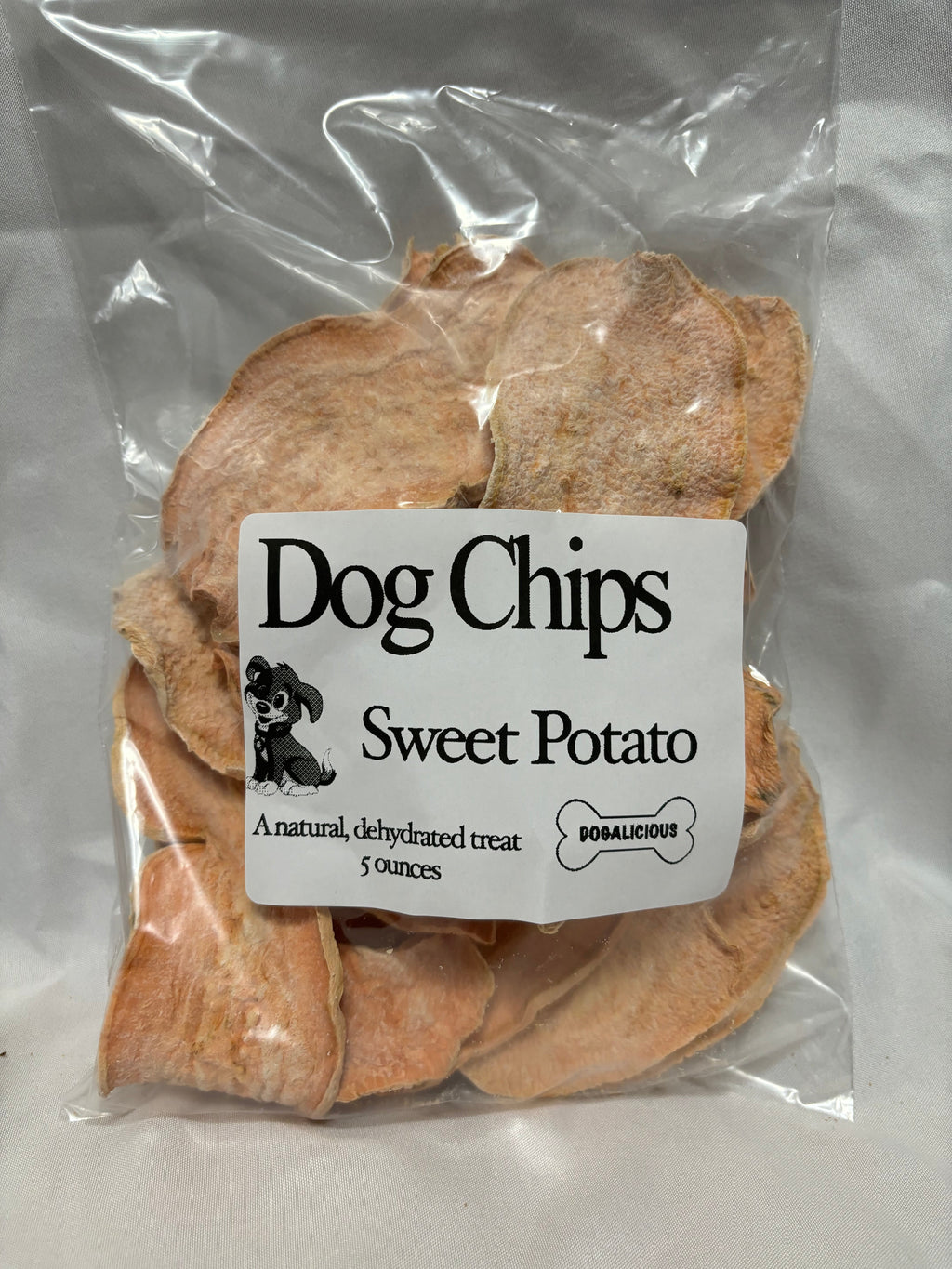 Dog Chips sweet potato treats in a labeled clear bag, 5 ounces.