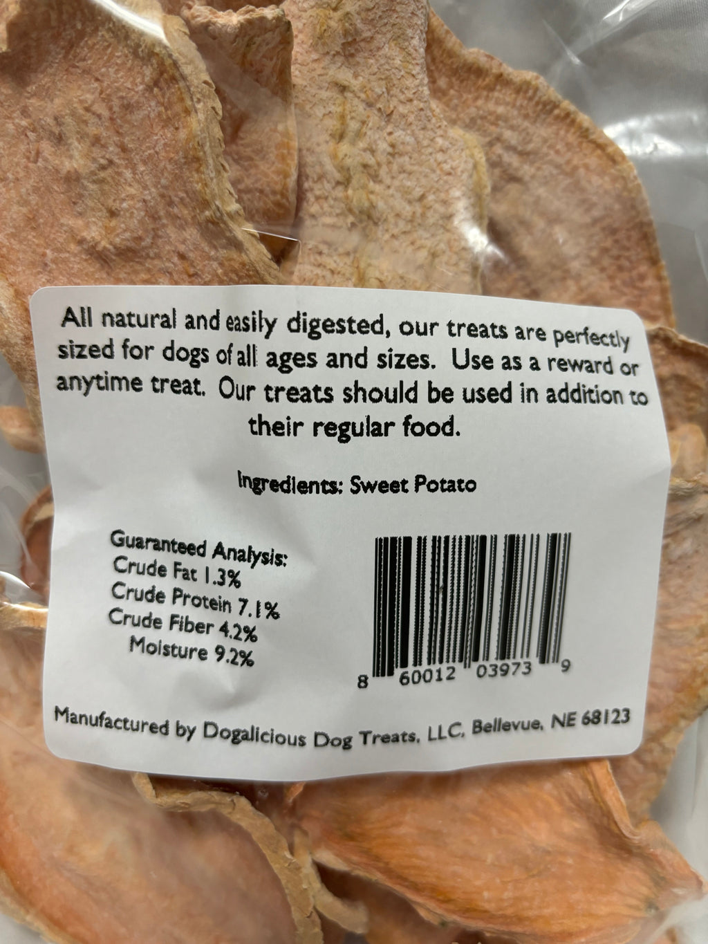 Sweet potato dog chips in a clear bag, with an ingredient and nutrition label.