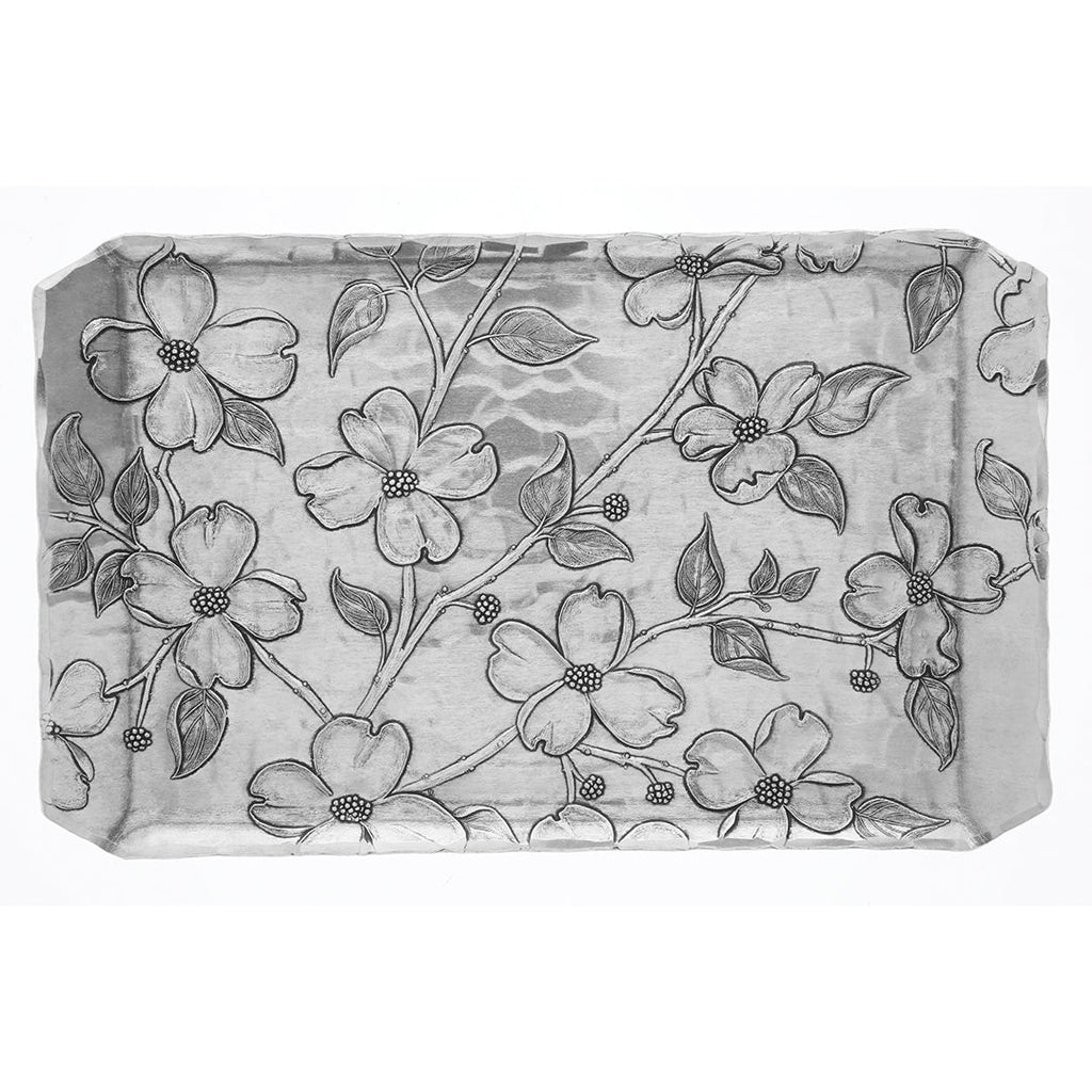 Dogwood butler tray with etched floral line pattern on light gray surface
