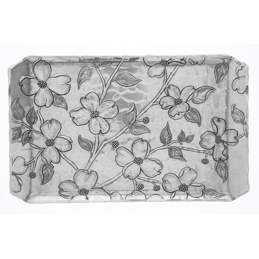 Dogwood butler tray with etched floral line pattern on light gray surface
