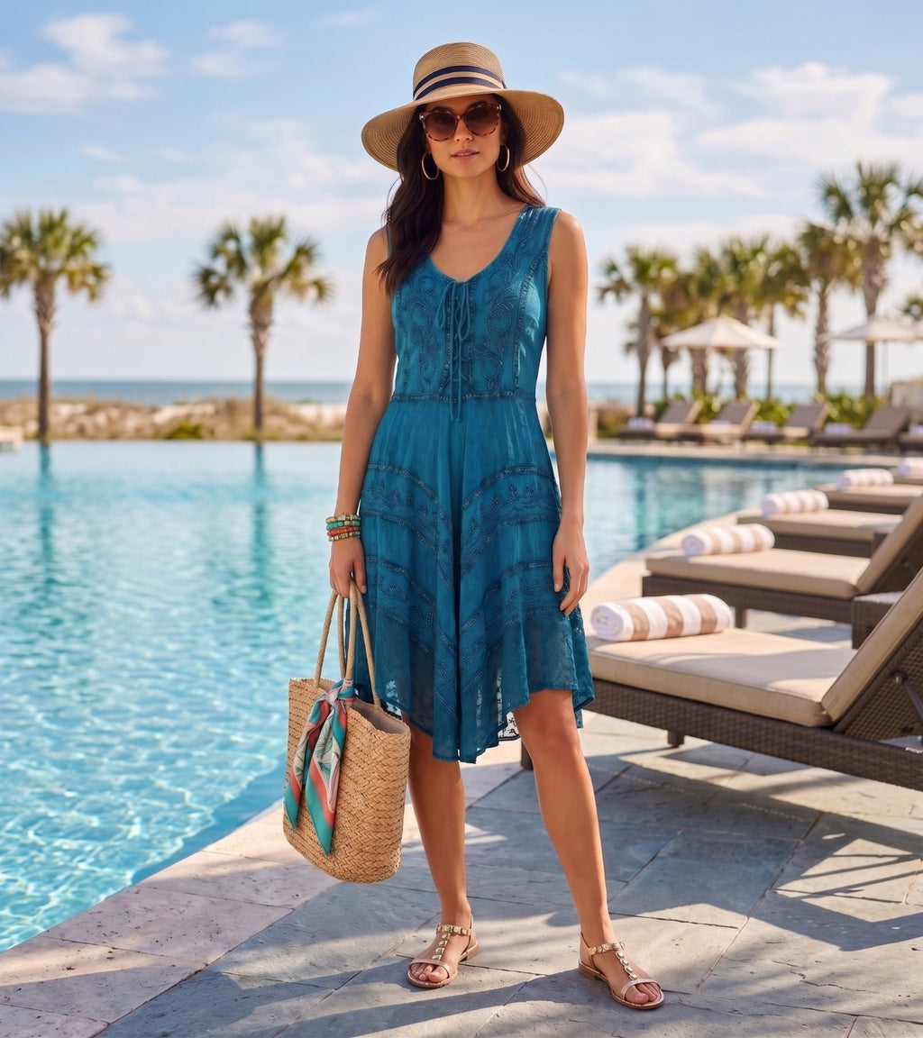 Blue stonewashed rayon midi dress with embroidered V-neck and tiered skirt