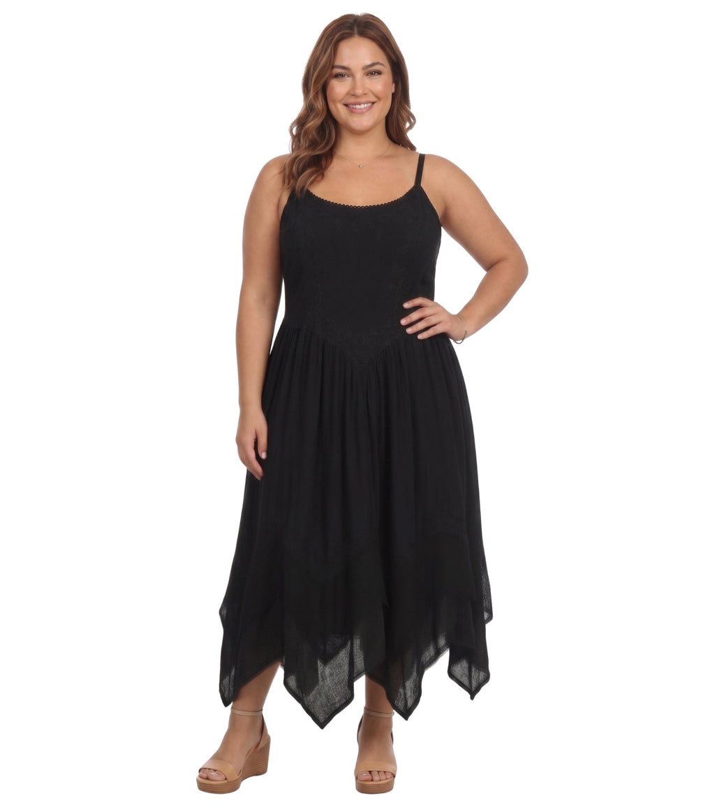 Black sleeveless long dress with thin straps, empire waist, and asymmetrical hem