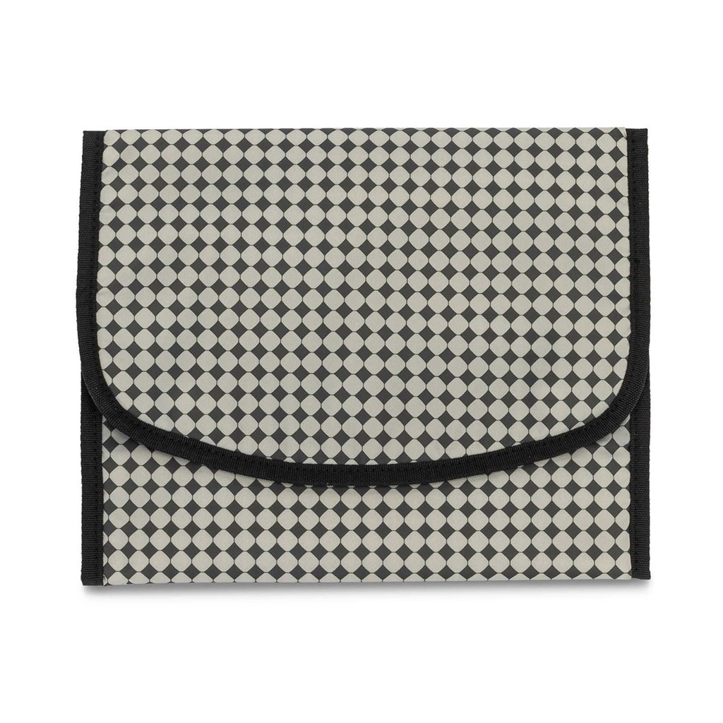 Black-and-cream patterned changing pad cover with black border