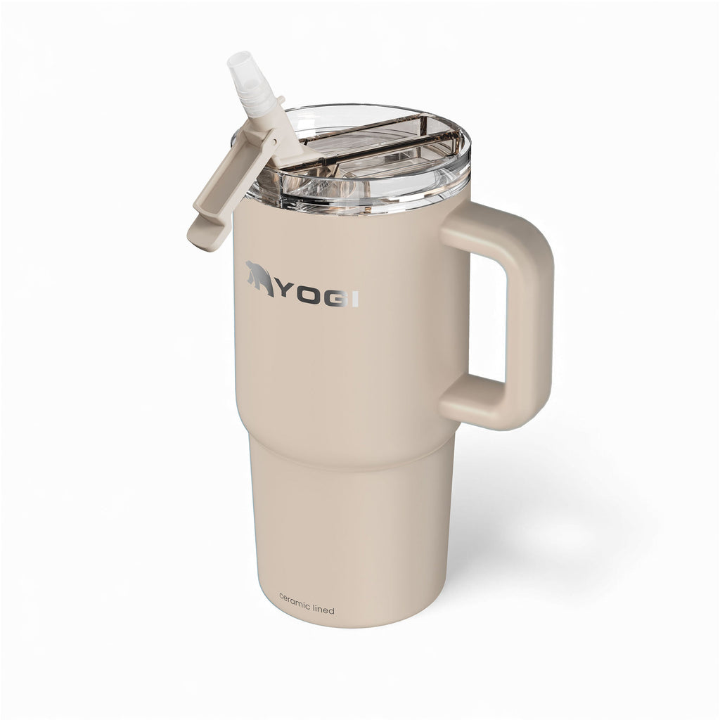 Ceramic-lined tumbler with open clear lid, straw tube, and side handle