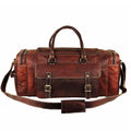 Brown leather weekender duffle with double buckled front pockets and shoulder strap