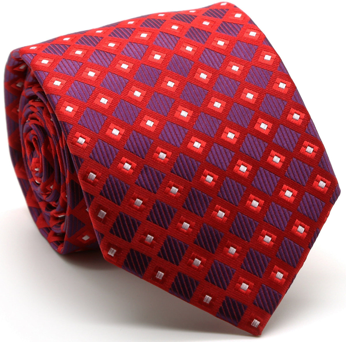 Red-and-blue checkered diamond tie with white square accents, rolled up.