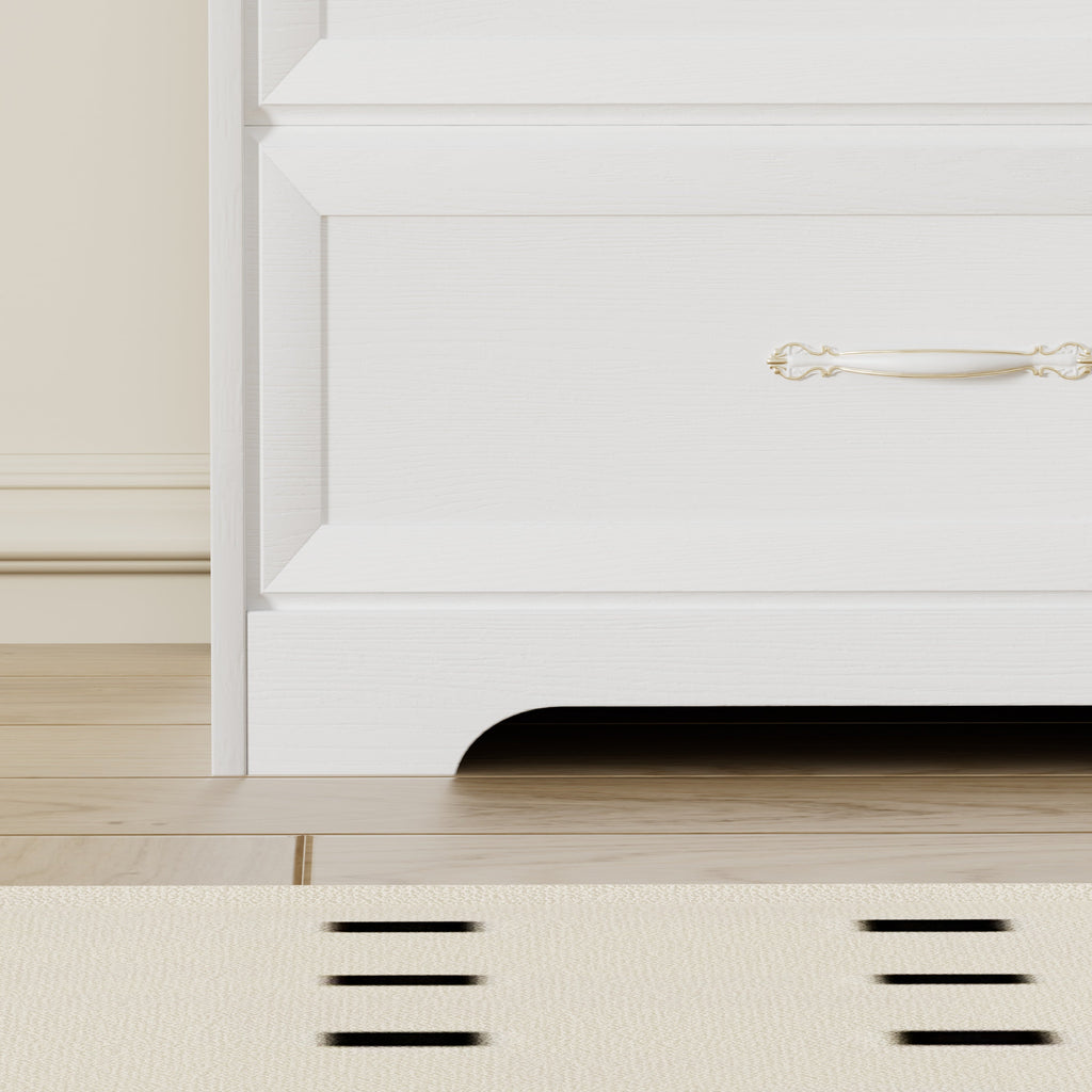 White dresser drawer front with gold metal pull and arched base