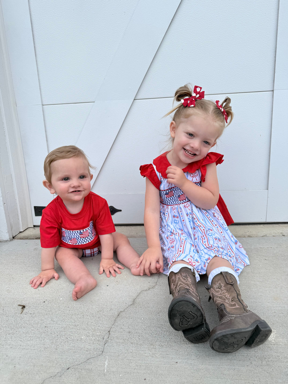 Girls patriotic smocked dress, red ruffled shoulder sleeves and blue striped skirt