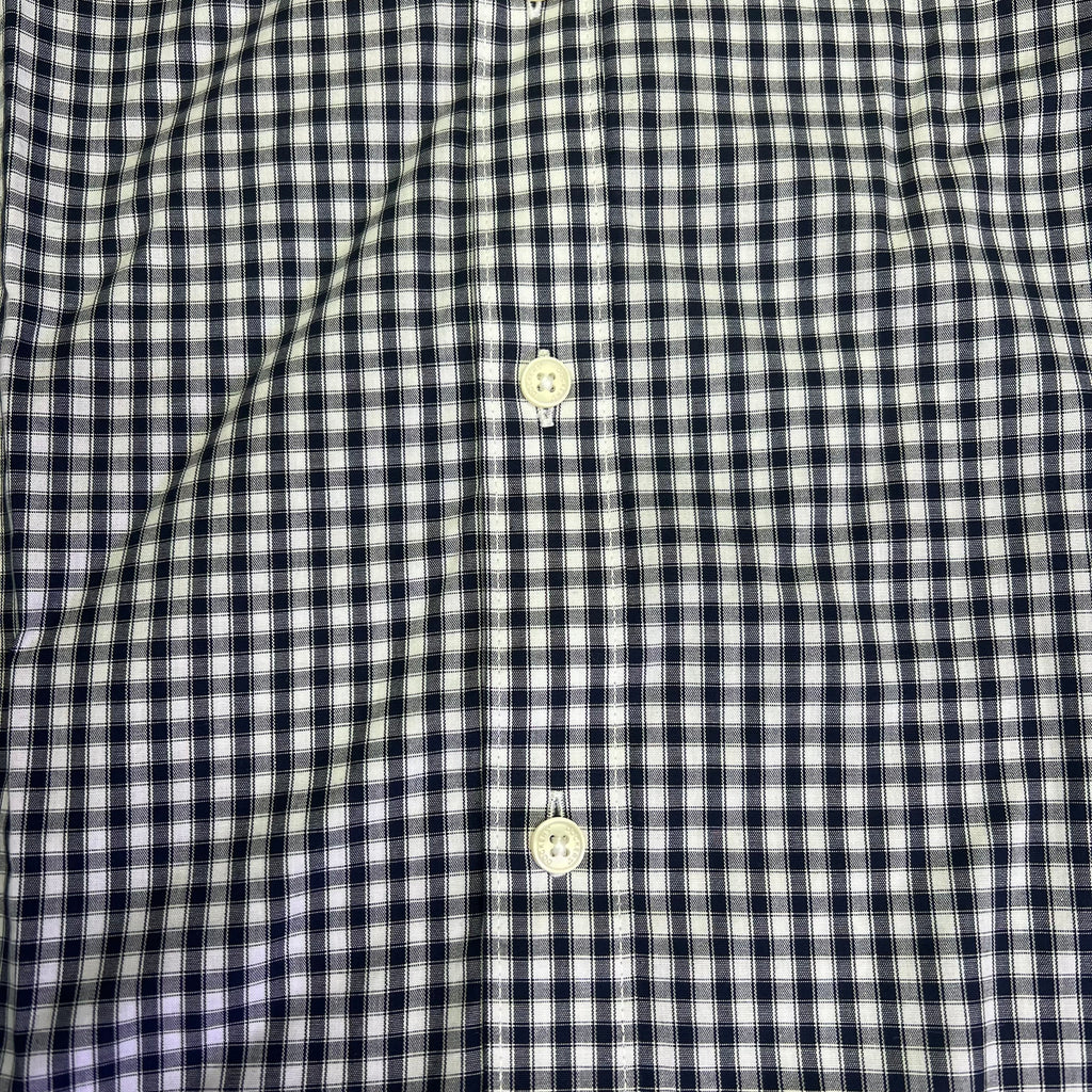 Men's checkered button-up shirt close-up, two-button front placket