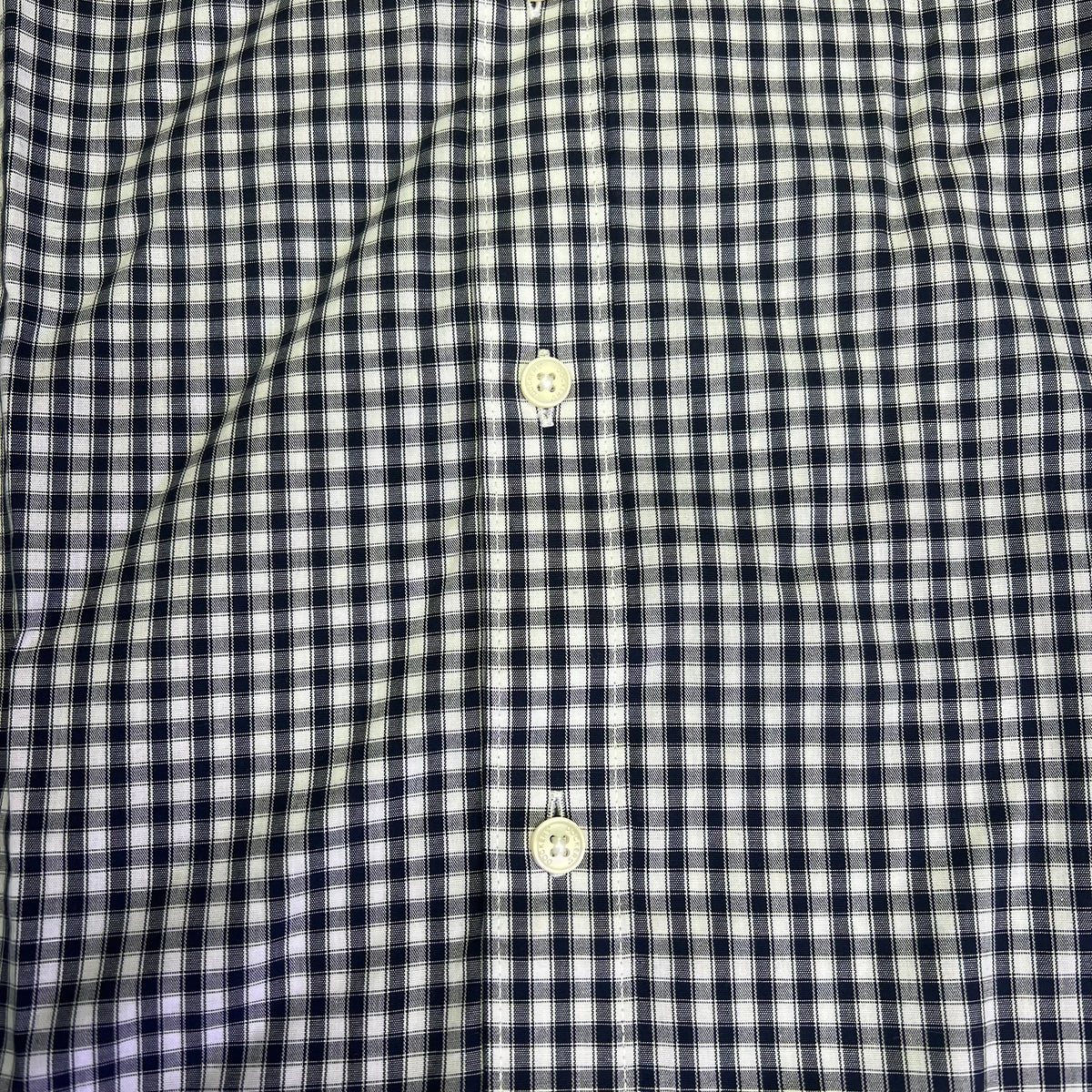 Men's checkered button-up shirt close-up, two-button front placket