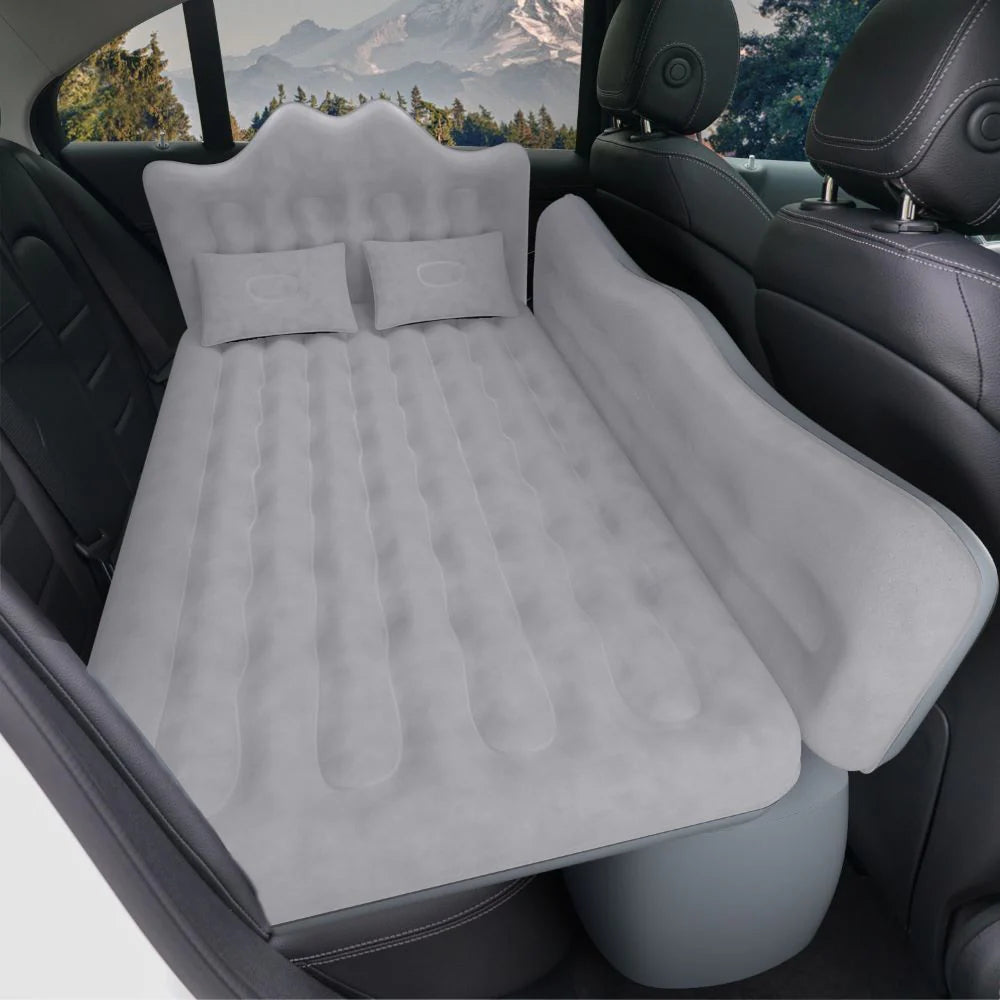 Gray inflatable back-seat air mattress with two raised pillows and quilted air cells