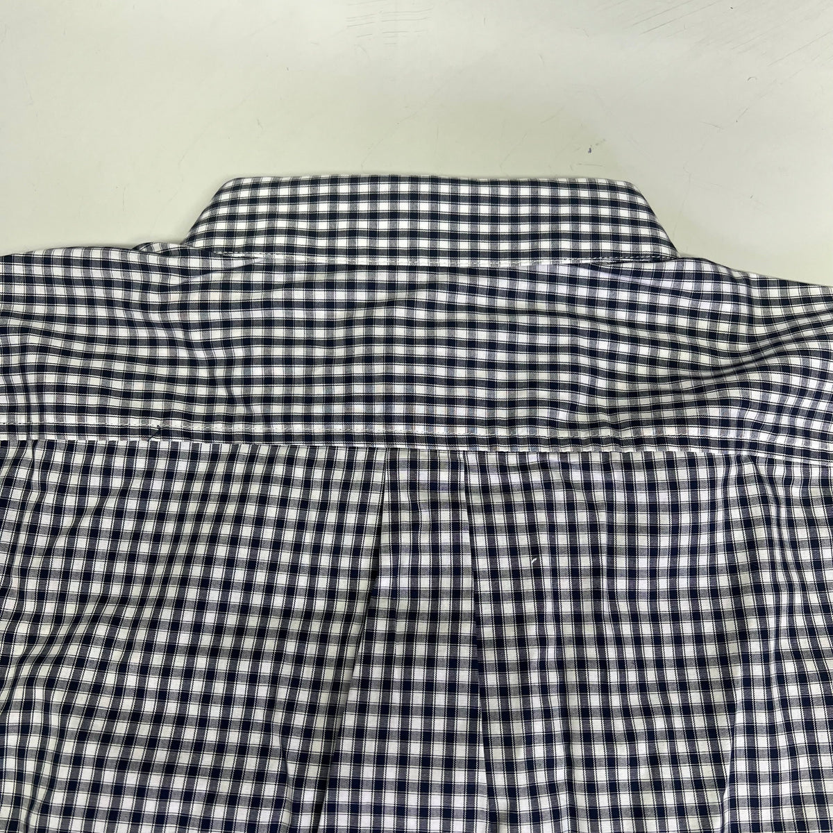Men's checkered button-up shirt back yoke and pleat seam