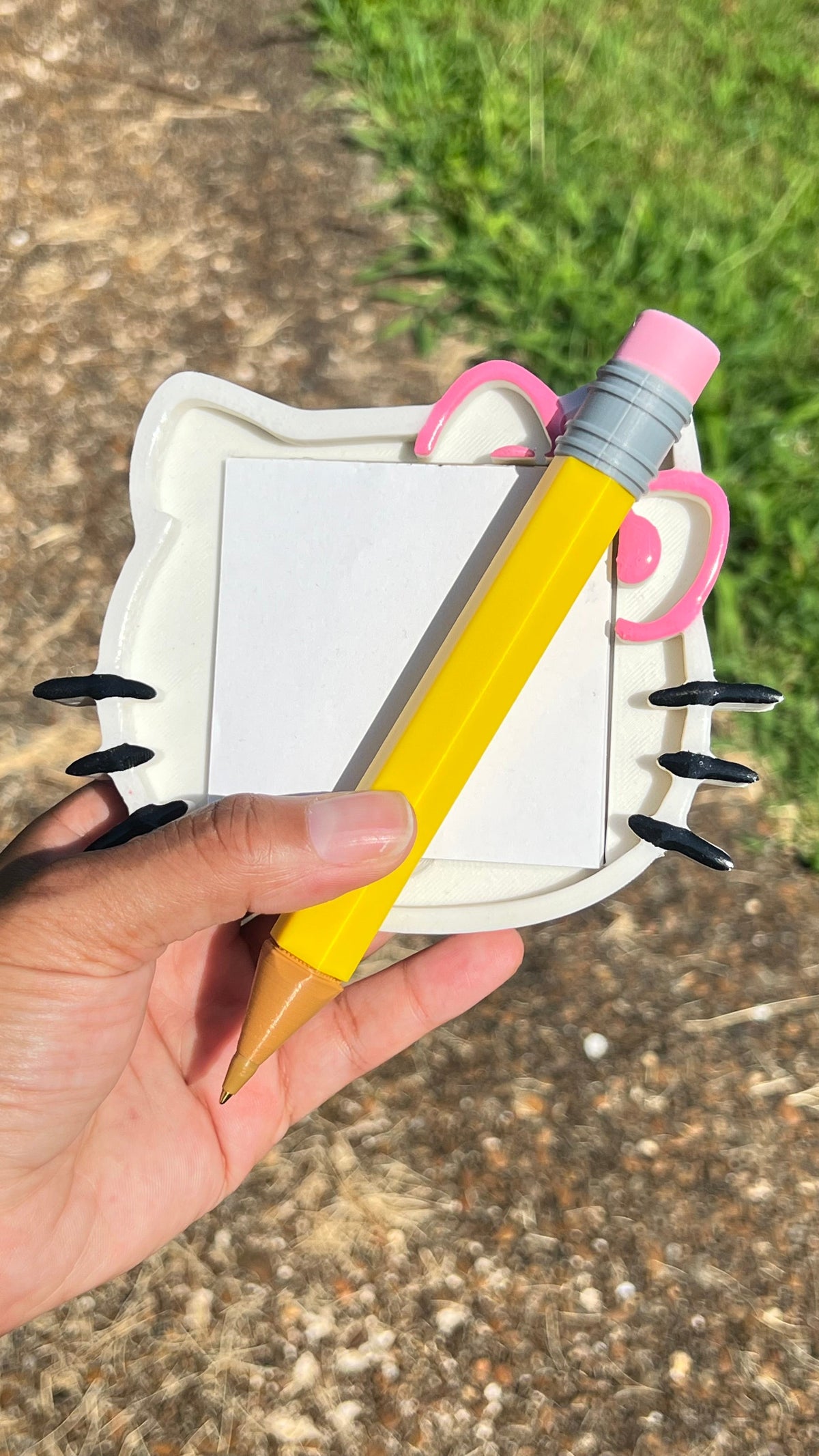 Jumbo yellow novelty pencil with pink eraser, gray striped band, pointed wooden tip
