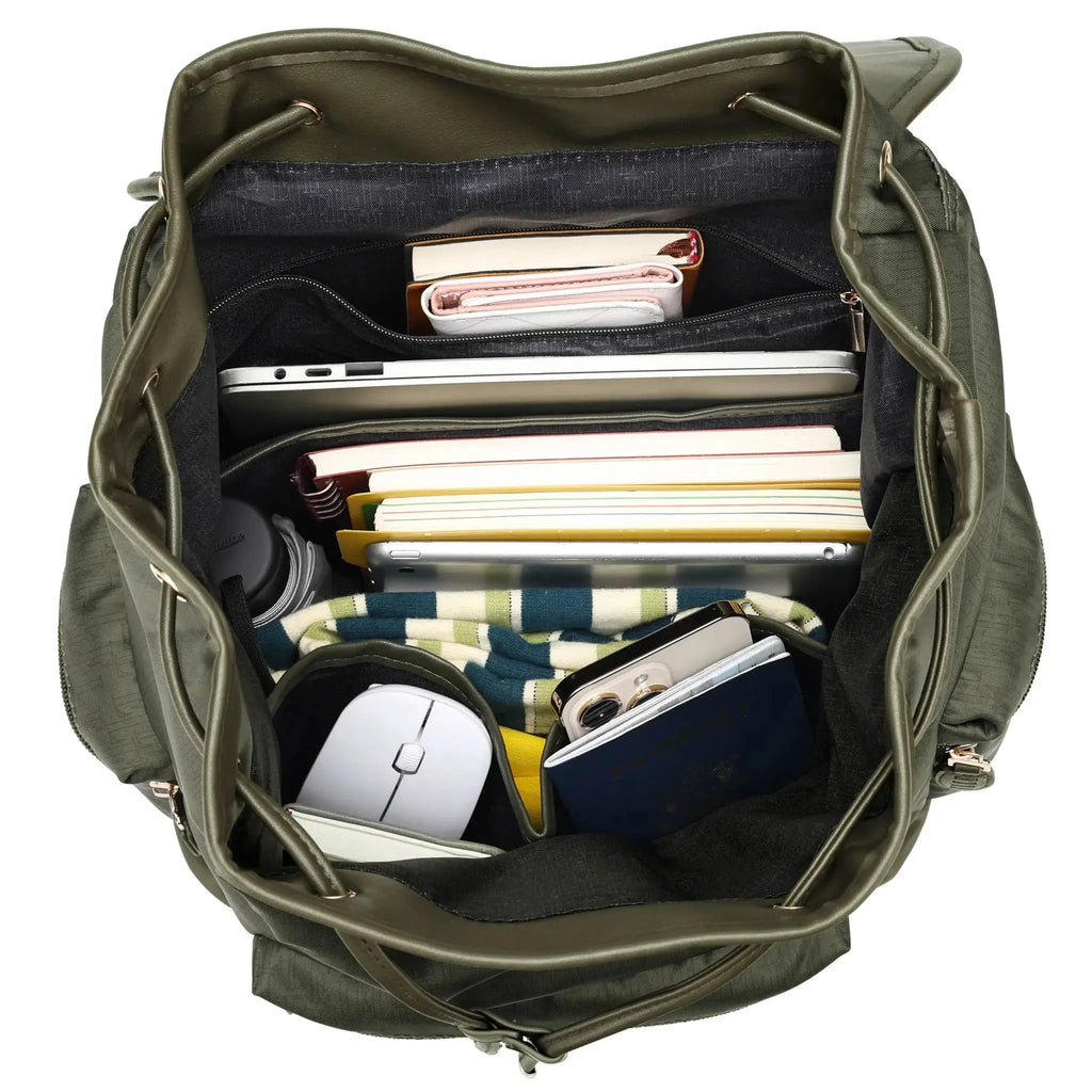 Olive green weekender duffel bag open, packed with notebooks and electronics