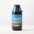 Elderberry kids immunity syrup bottle with blue label and black cap