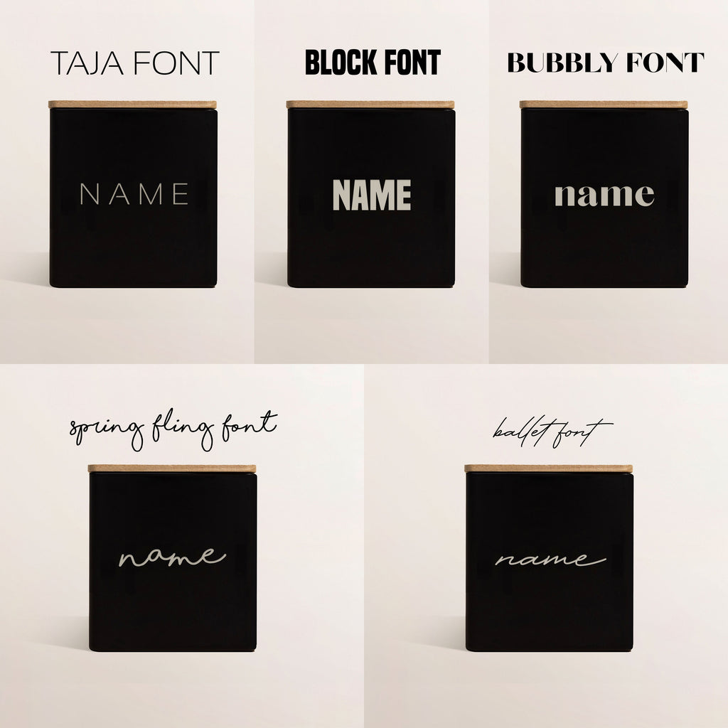 Set of black engraved candles showing name font styles: Taja, Block, Bubbly, script