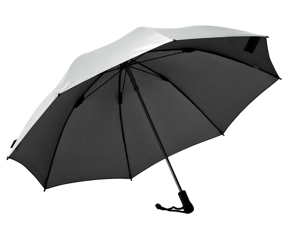 Trekking umbrella with white upper panel, black canopy underside, black frame