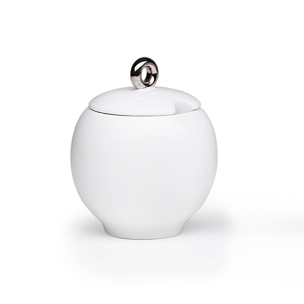 White ceramic sugar bowl with lid and metal-ring handle detail