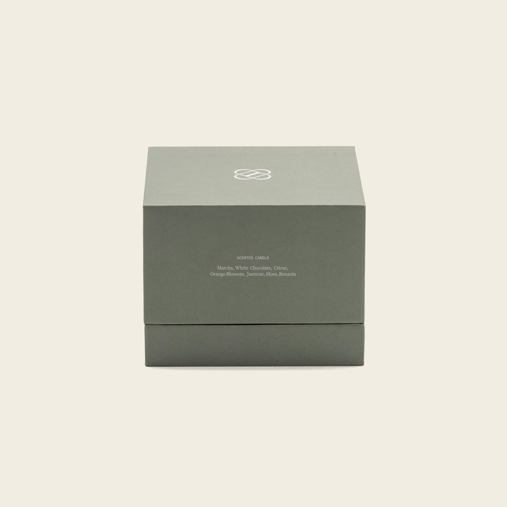 Dark green gift box for Matcha Bloom ceramic soy candle, with brand logo on top.