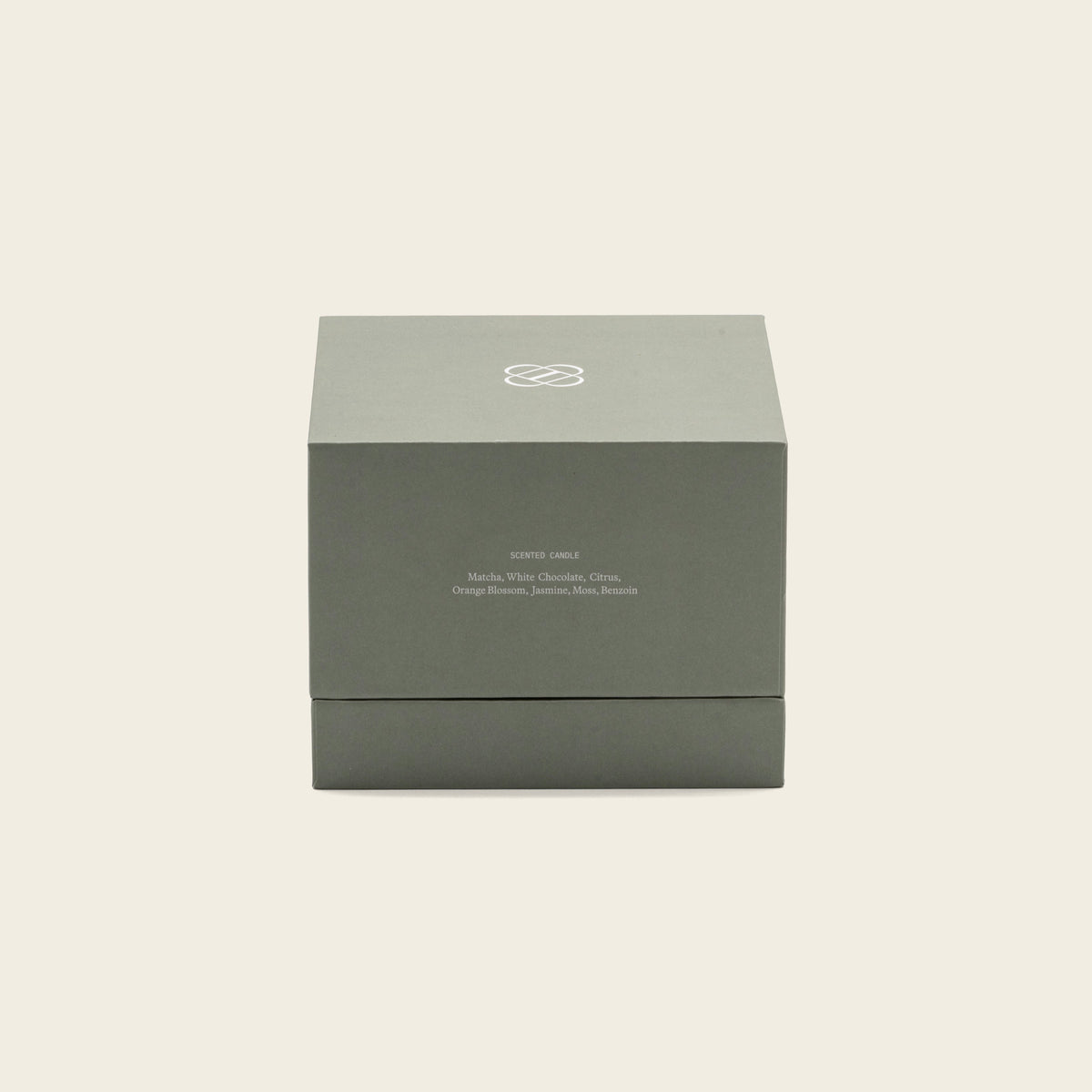 Dark green gift box for Matcha Bloom ceramic soy candle, with brand logo on top.