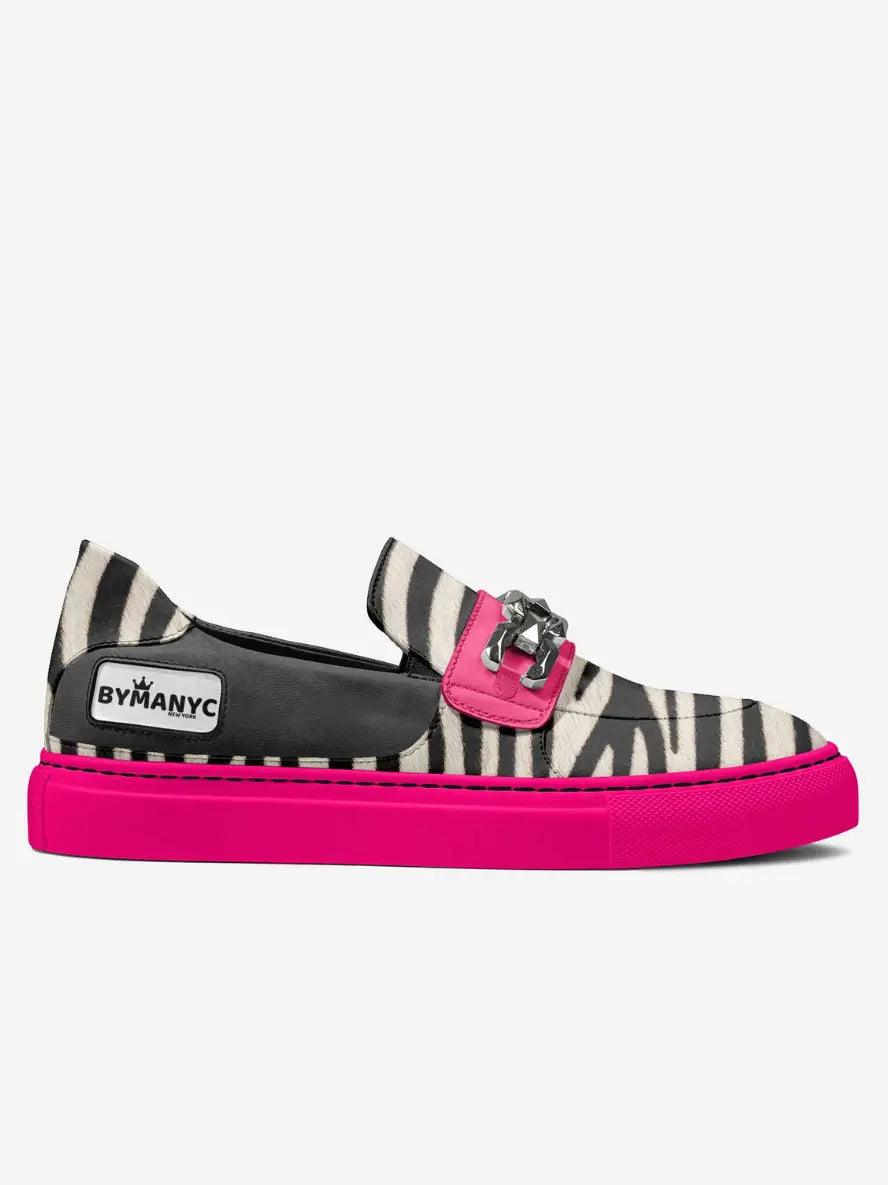 Pink and zebra-print low-top sneaker with buckle strap and BYMANYC logo patch