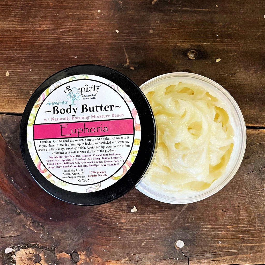 Body butter jar open with white-yellow whipped cream