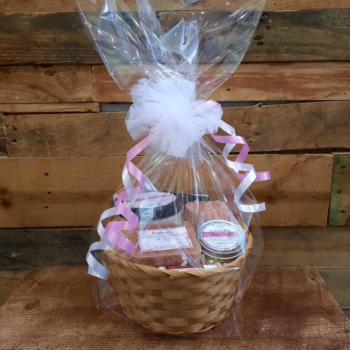 Medium Scentastic gift set basket wrapped in clear plastic with Euphoria body butter, lotion bar