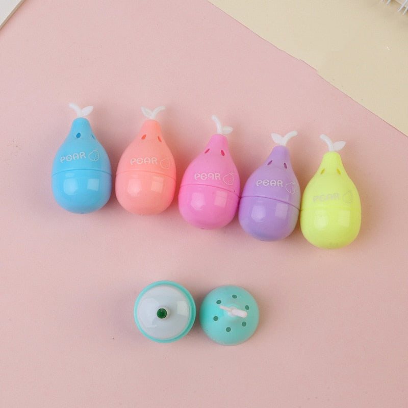 Pear-shaped pastel highlighters labeled "PEAR" plus one small round case.