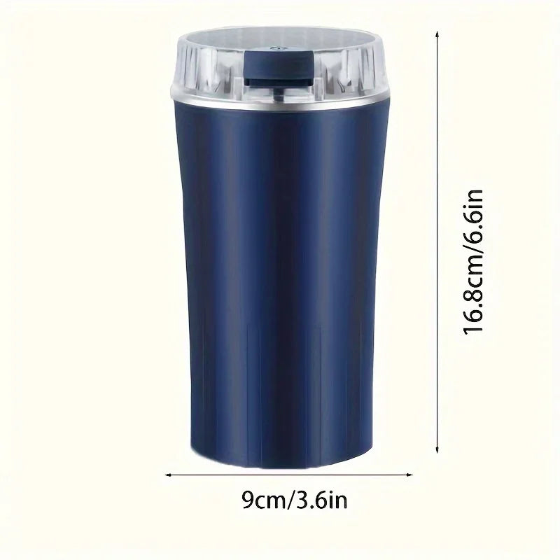 Electric blue coffee grinder with clear lid and top one-press switch, front view