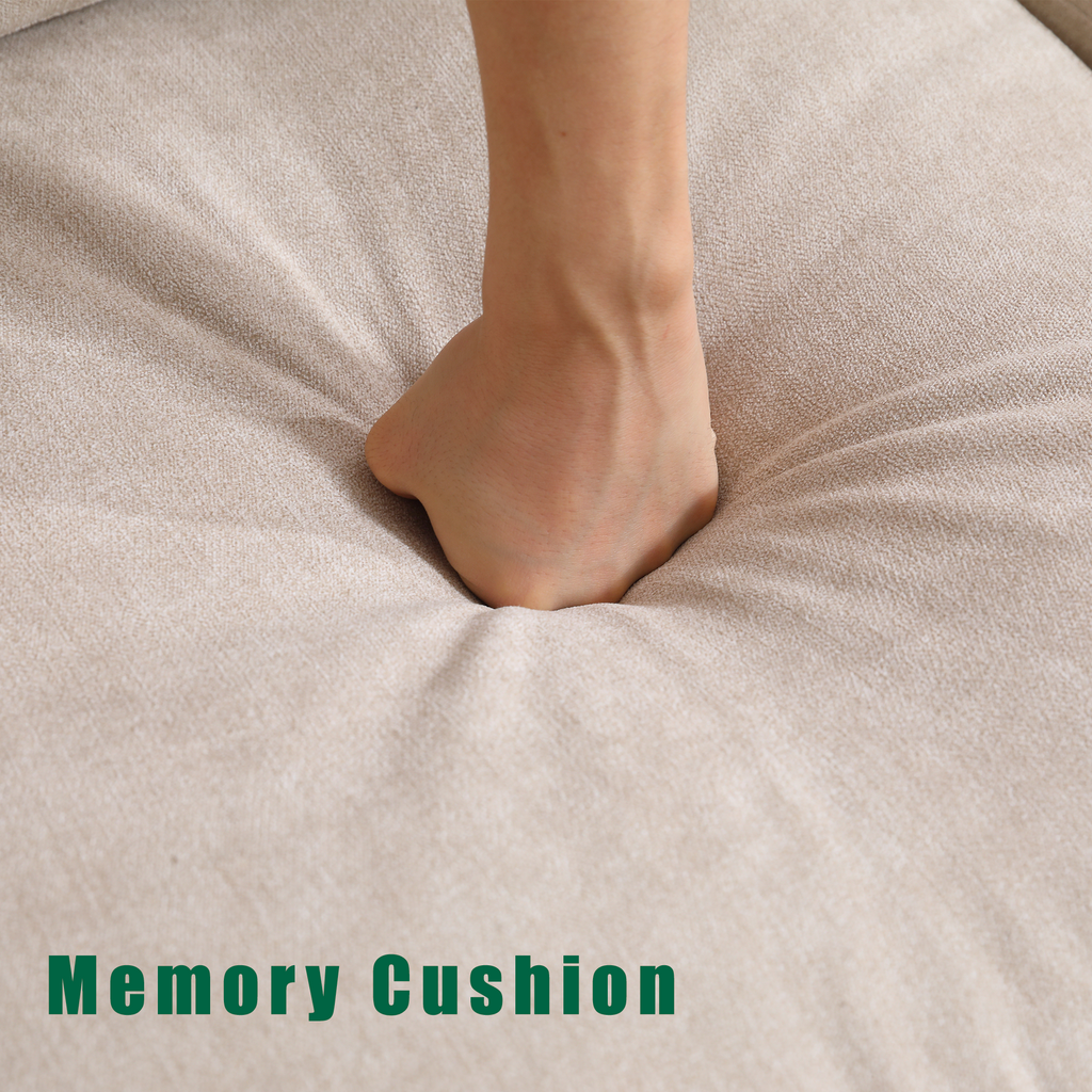 Beige linen seat cushion with a foot resting on the sofa surface